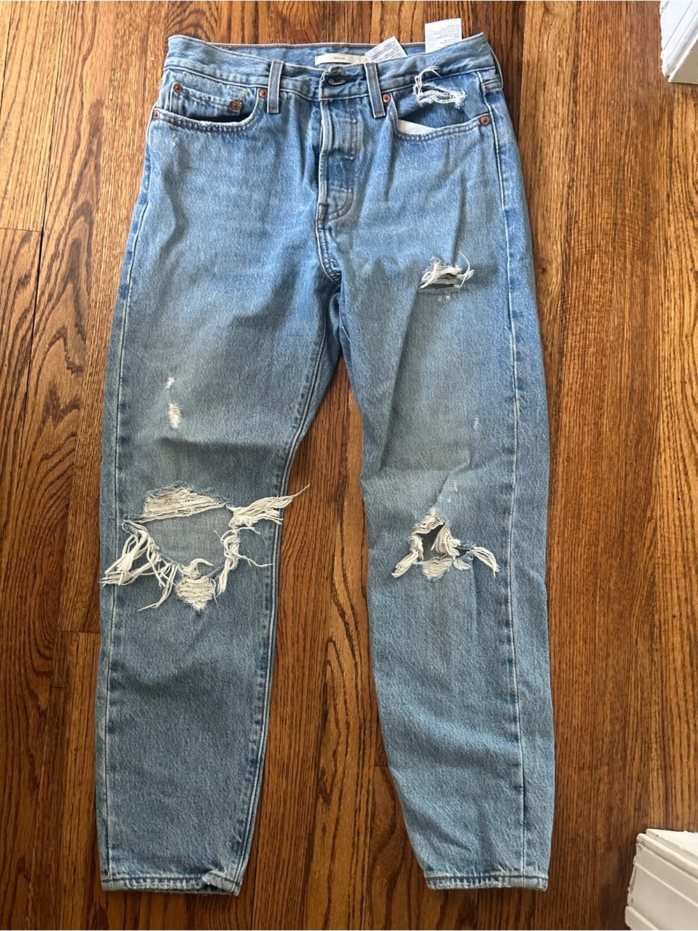 Women’s Light Blue Distressed Ripped Levi Jeans